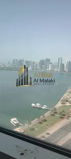 Elegant Two-Bedroom Apartment with Balcony in Al Majaz