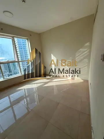 Spacious 3-Bedroom Apartment for Annual Rent Prime Location in Al Qasba with Free Parking