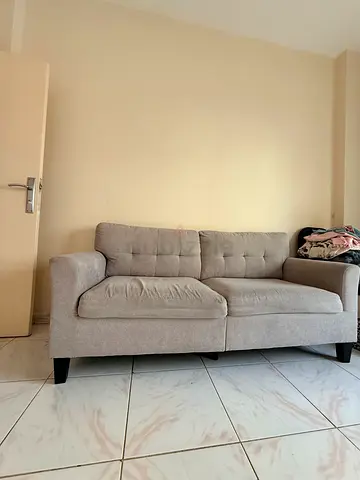 Light grey 3-seater sofa in good condition