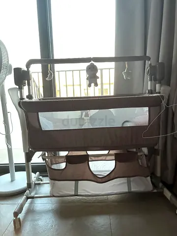 Portable Baby Bassinet and Crib with Wheels