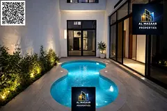 Corner villa for sale with indoor pool, high-end finishing and modern design, two floors and a roof.