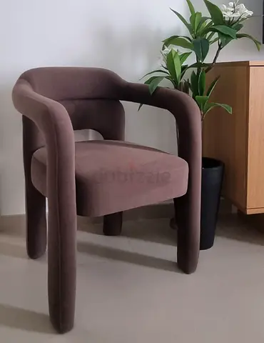 Modern brown velvet accent chair with rounded arms