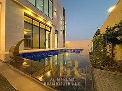 Own a luxurious villa with a modern design and high-end personal finishes in the Al Zahia area of 