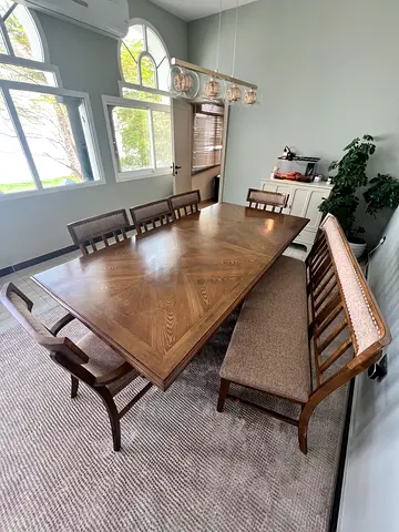 Wooden 8-seater dining table with chairs