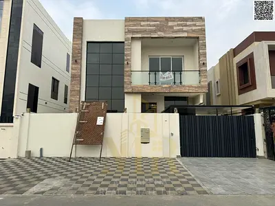 For sale: Modern villa in Al Yasmin area, Ajman (two floors + roof). Prime location near Al Hamidiya Park. Price includes registration and ownership f