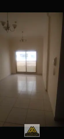 High-Yield Real Estate Investment Opportunity: Tenanted 1BHK High-Floor Apartment with Covered Parking in Majestic Tower C3, Emirates City, Ajman