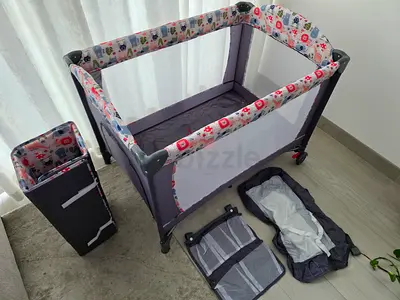 Barely used portable baby crib with all accessories!