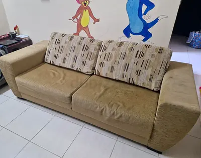 3-seater beige fabric sofa with patterned back cushions - used