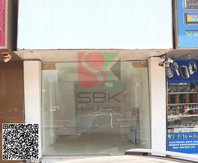 SPACIOUS SHOP FOR RENT – KARAMA PLAZA BUILDING, AL BUSTAN, AJMAN