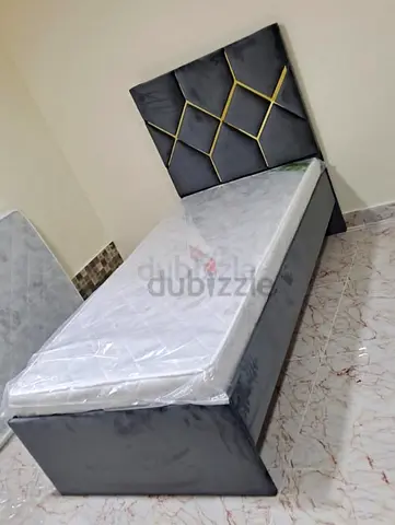 Single Grey Velvet Bed with Geometric Headboard