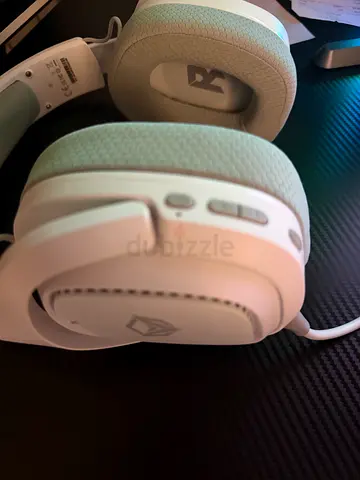 White over-ear wireless headphones — lightly used, good condition
