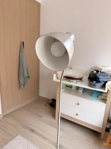 Simple silver floor lamp with adjustable head - good condition