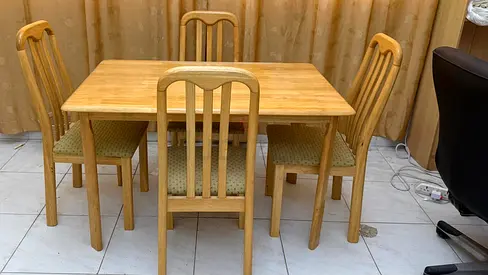 Solid Wood Dining Table with 4 Matching Chairs - Good Condition