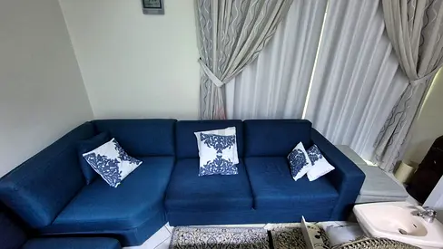 Home Center eterno U shape sofa Blue great Condition