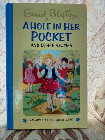 A Hole in Her Pocket and Other Stories by Enid Blyton - Hardcover