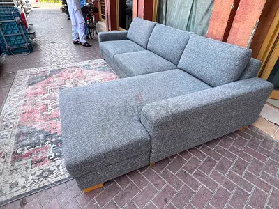 Ikea L Shape Sorvallen couch inside storage