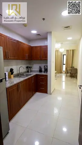غرفة نوم وصالة في "لايك تاور" (مدينة الامارات، عجمان).