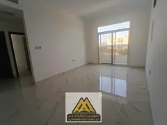 A great family rental opportunity in Al Muwaihat 3, Ajman, offering a 2-bedroom apartment with a pra