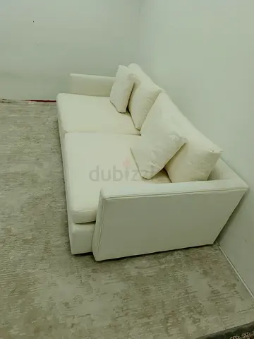 Off white color crate and barrel 3 seater sofa