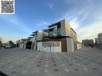 Luxury villa for sale in Al Rawda 3 with an area of 5000 sq ft, an exceptional location close to all services, including water, electricity, and air c