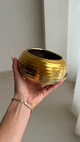 Small decorative gold vase