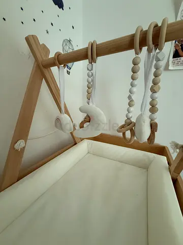 Wooden Baby Play Gym with Hanging Toys - Neutral Cream + cupboard