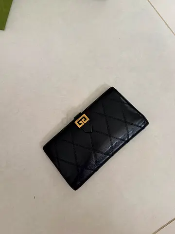 GIVENCHY Black quilted long women's wallet with gold clasp excellent condition !
