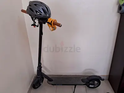 Electric scooter for adults with charger.