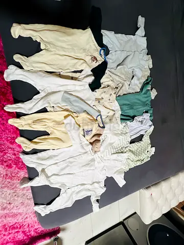 Mixed lot of baby onesies and rompers - newborn to 3 months