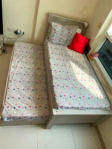 Wooden single bed with pull-out trundle mattress - good condition