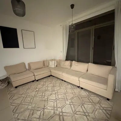 Light beige modular L-shaped 6-seater sofa