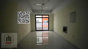 For rent in Al Muwaihat area | Two-bedroom apartment with a living room, opposite schools