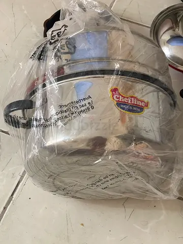 Used stainless steel cooking pot set (3 pieces) - good condition