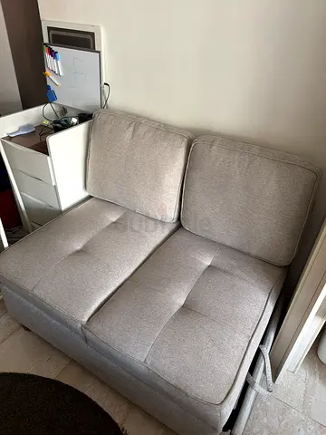 Light grey 2-seater sofa in good condition sofa bed