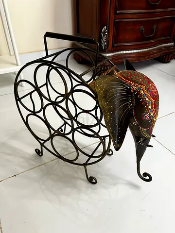 Elephant shape wrought iron wine / bottle rack
