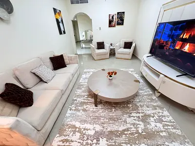 Three bedrooms / 2 living rooms / balcony / hotel-style furnishings / Al Taawun / Sharjah