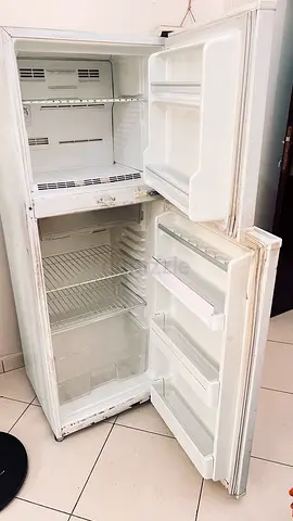 Selling a refrigerator in proper working condition.