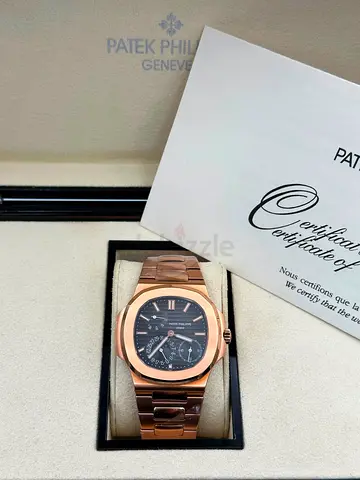 This is a Patek Philippe Nautilus Ref💯 supermaster quality Swiss machine in 18k rose gold featur