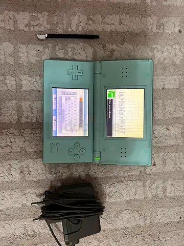 Mint green Nintendo DS Lite with charger and stylus - good working condition