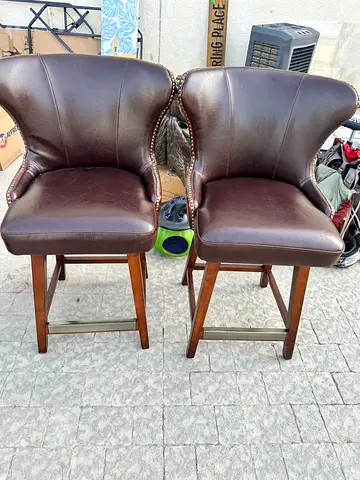 Pair of revolving Brown Leather Bar Stools