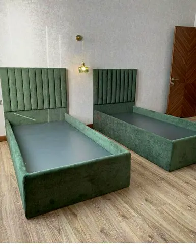 Pair of Green Velvet Single Beds with Padded Headboards