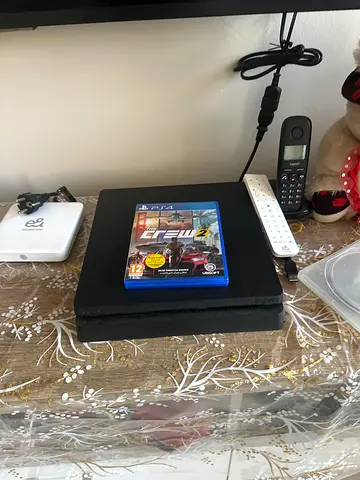 PlayStation 4 Slim with one controller and game (good working condition)