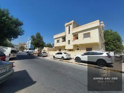 Prime Residential Investment Building for Sale in Al Nuaimiya 2, Ajman. 3,700 sqft plot, 9 units, AED 157K annual income, with strong growth potential