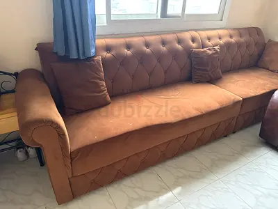 Brown Tufted Sofa with Cushions