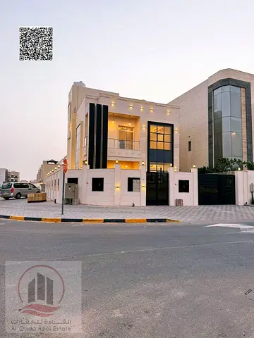 Villa for sale in Ajman, Al Zahia, 4 master bedrooms with roof terrace, majlis, living room, and maid's room. Freehold ownership for all nationalities