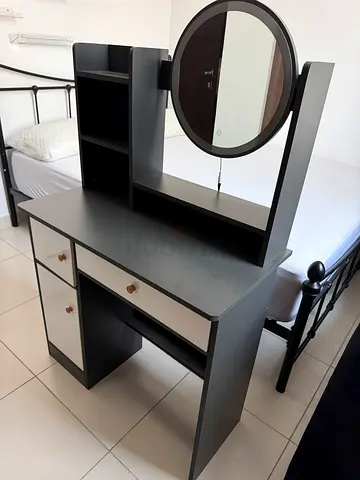 Compact dressing table with lighted mirror and storage drawers