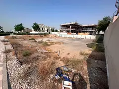BIG CORNER LAND . FREE HOLD FOR SALE IN AL KHAWANEEJ FIRST .LAST EXIT