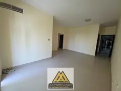 Large 2BR in Al Nuaimiya 2, 2 baths, balcony, central AC. AED 30K yearly, payable in 4 installments.