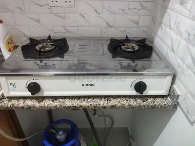 Gas cylinder with Rinnai 2-Burner Gas Stove, and cylinder with full filled.