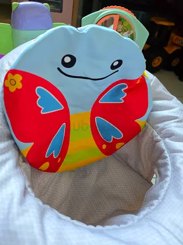 Baby bouncer / rocker seat with colorful padded cover,  very good condition(like new)